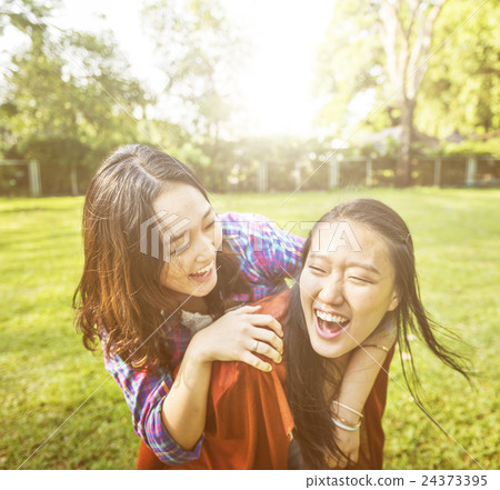 Sister Friendship Embracing Adorable Outside Concept 24373395