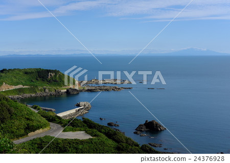 Shimazaki in front of the gate and Chokaiyama seen far away Shimazaki in front of the gate and Chokaiyama seen far away 24376928