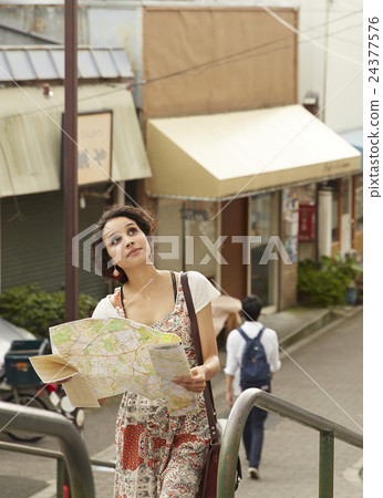 Foreign travelers sightseeing Tanoya 24377576