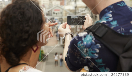 Foreign travelers sightseeing Tanoya 24377589