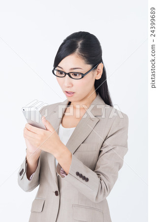 Business woman (smartphone) Business woman (smartphone) 24399689