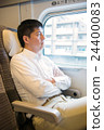 Men relaxing in the train of the bullet train 24400083