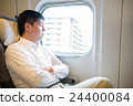 Men relaxing in the train of the bullet train 24400084