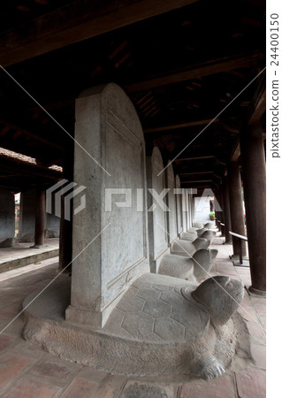A turtle carrying a monument of a monastery of the Temple of Literature in Hanoi (a stone table shaped like a turtle) 24400150