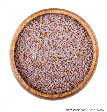 Psyllium seed husks in a bowl over white 24406287