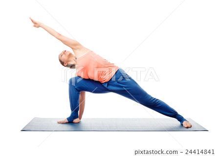 Woman doing Ashtanga Vinyasa Yoga asana Utthita 24414841