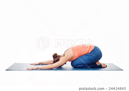Woman doing Ashtanga Vinyasa Yoga relaxation asana Woman doing Ashtanga Vinyasa Yoga relaxation asana 24414843