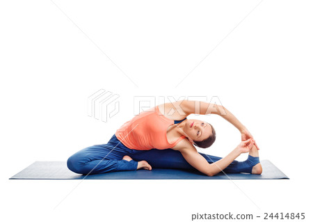 Sporty fit yogini woman practices yoga asana Sporty fit yogini woman practices yoga asana 24414845