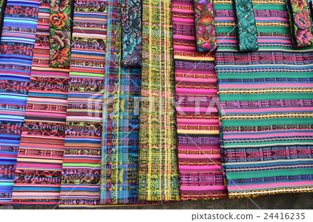 Guatemala, San Francisco Fabric for traditional costumes sold in Sunday city in El Alto village 24416235