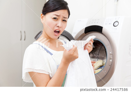 Housewife troubled by washing Housewife troubled by washing 24417586