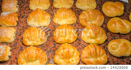 Croissant bread on table in buffet . 24428808
