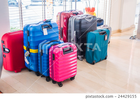 Suitcases and travel bag . 24429155