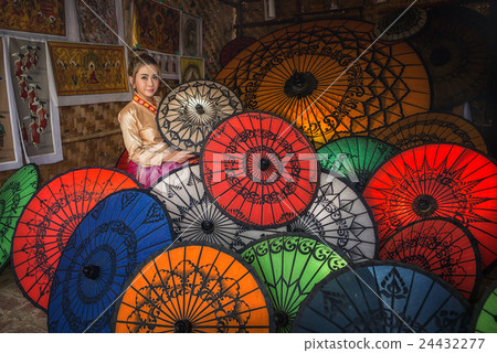Asian Women in Umbrella Shop in Bagan in Myanmar Asian Women in Umbrella Shop in Bagan in Myanmar 24432277