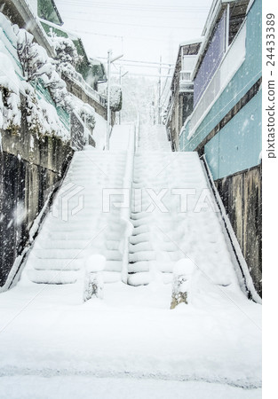 Residential area on a snowy day 24433389