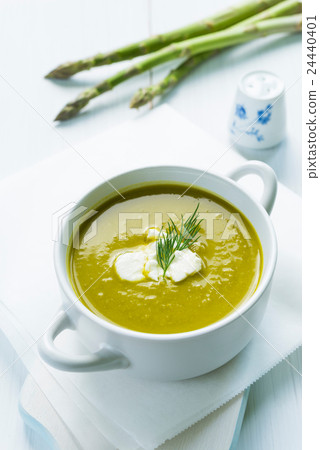 Bowl of asparagus soup with fresh cream and dill Bowl of asparagus soup with fresh cream and dill 24440401