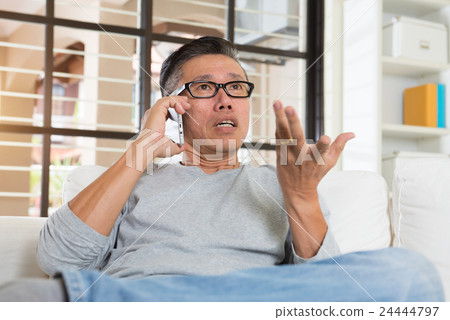 depressed matured asian man on the phone depressed matured asian man on the phone 24444797