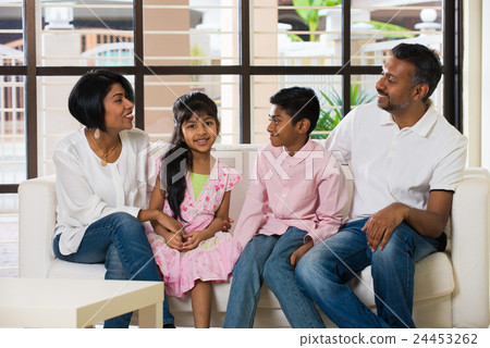 happy indian family at living room 24453262