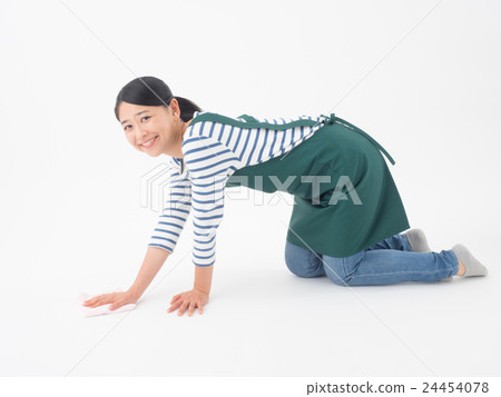 A young lady wiping the floor 24454078