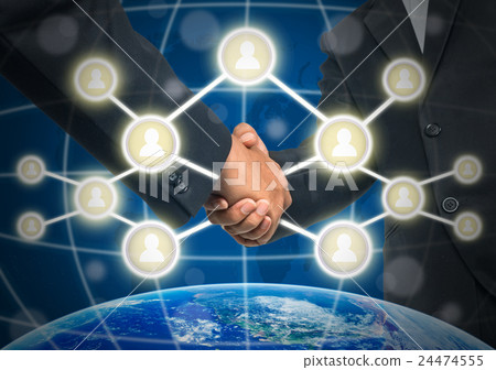 Business handshake with Social media symbol over the world map background, Elements of this image furnished by NASA, Business social netwok concept 24474555