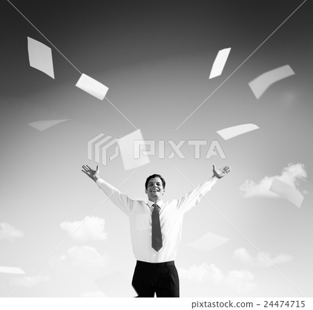 Business Man on the Field with his Arms Raised Throwing Paperwor Business Man on the Field with his Arms Raised Throwing Paperwor 24474715