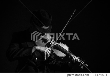 Close up Violin player in dark studio, Musical concept Close up Violin player in dark studio, Musical concept 24474801