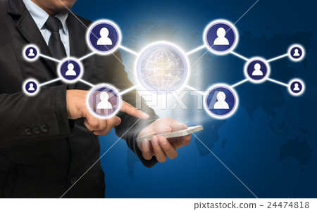 Businessman using the smart phone with the Social media symbol on blue color background with world map,Elements of this image furnished by NASA, Business network concept Businessman using the smart phone with the Social media symbol on blue color background with world map,Elements of this image furnished by NASA, Business network concept 24474818