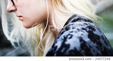 Young Woman Skater Browsing Phone Concept Young Woman Skater Browsing Phone Concept 24477249