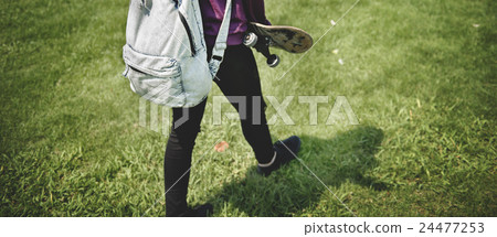 Young Woman Skater Walking Active Concept 24477253