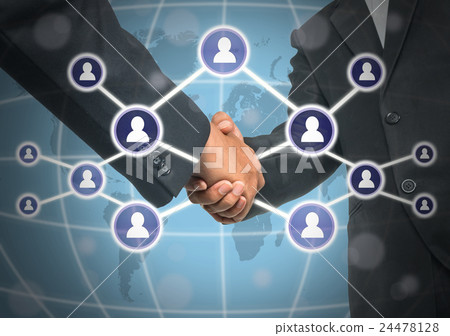 Business handshake with Social media symbol over the world map background, Elements of this image furnished by NASA, Business social netwok concept 24478128
