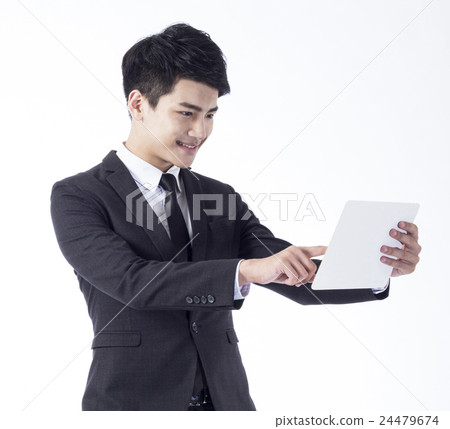 portrait of young businessman 24479674