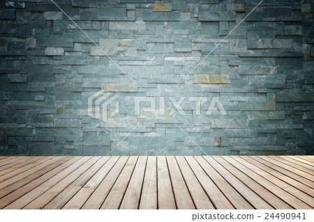 Empty top of wooden floor and natural stone wall 24490941