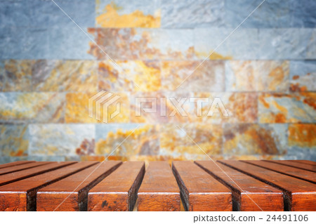 Empty top wooden table and stone wall background Empty top wooden table and stone wall background 24491106