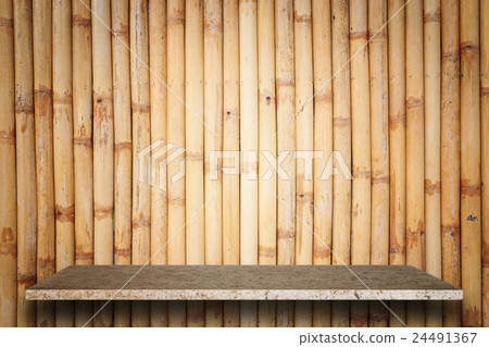 Empty top of natural stone shelves and bamboo wall background Empty top of natural stone shelves and bamboo wall background 24491367