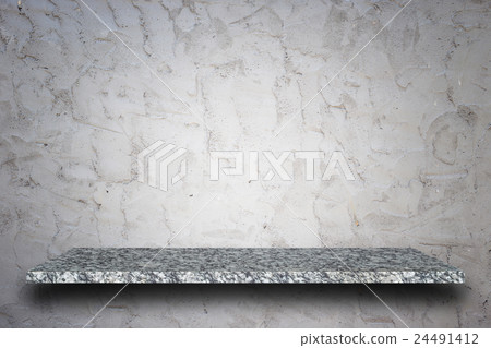Empty top of natural stone shelves and stone wall background 24491412
