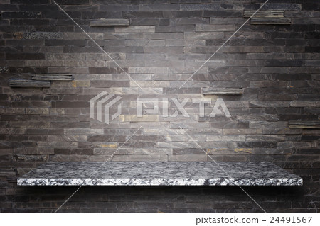 Empty top of natural stone shelves and stone wall background Empty top of natural stone shelves and stone wall background 24491567