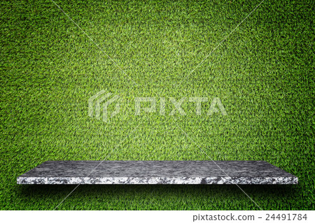 Empty top of natural stone shelves and green pattern wall background Empty top of natural stone shelves and green pattern wall background 24491784
