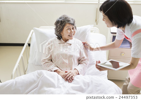 A young caregiver A young caregiver 24497353