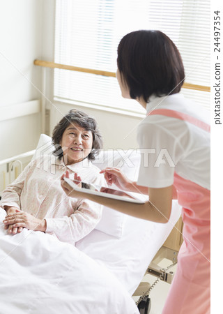 A young caregiver A young caregiver 24497354