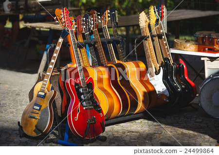 Guitars at flea market Guitars at flea market 24499864