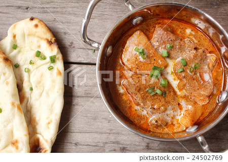 Indian naan bread with curry 24502769