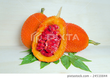 Gac fruit, typical of orange-colored plant foods  24510844