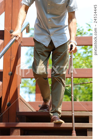 Senior men getting off the stairs 24514445