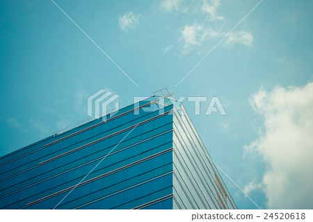 Glass building with blue sky Glass building with blue sky 24520618