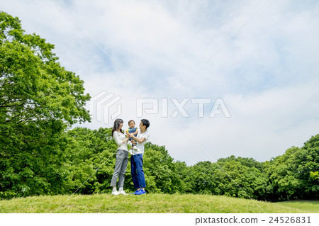 Parents playing in the park of fresh green Parents playing in the park of fresh green 24526831