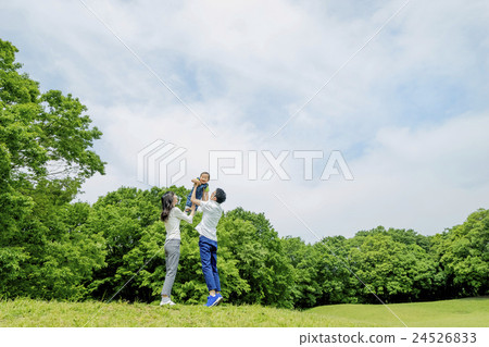 Parents playing in the park of fresh green Parents playing in the park of fresh green 24526833