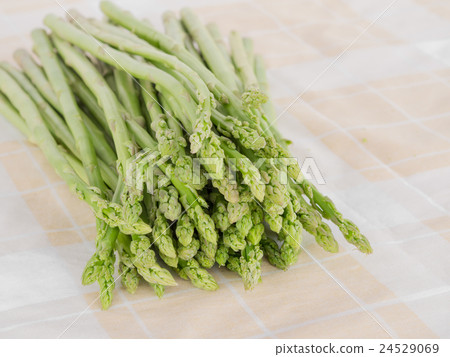 Fresh asparagus, on The fabric is placed. Fresh asparagus, on The fabric is placed. 24529069