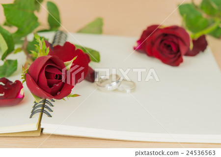 Red roses and ring, romantic backgroud 24536563