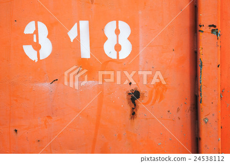 Grungy red metal wall with white number 318 Grungy red metal wall with white number 318 24538112
