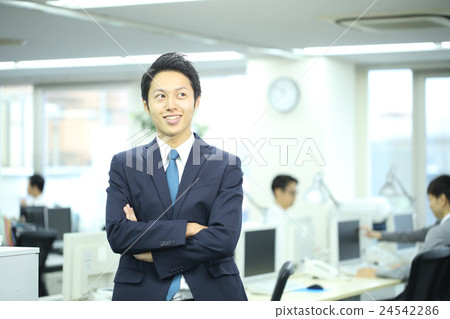 A man working in his 30's A man working in his 30's 24542286