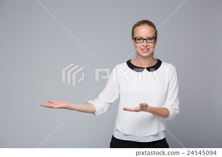 Stock Photo: Business woman showing hand sign to side.